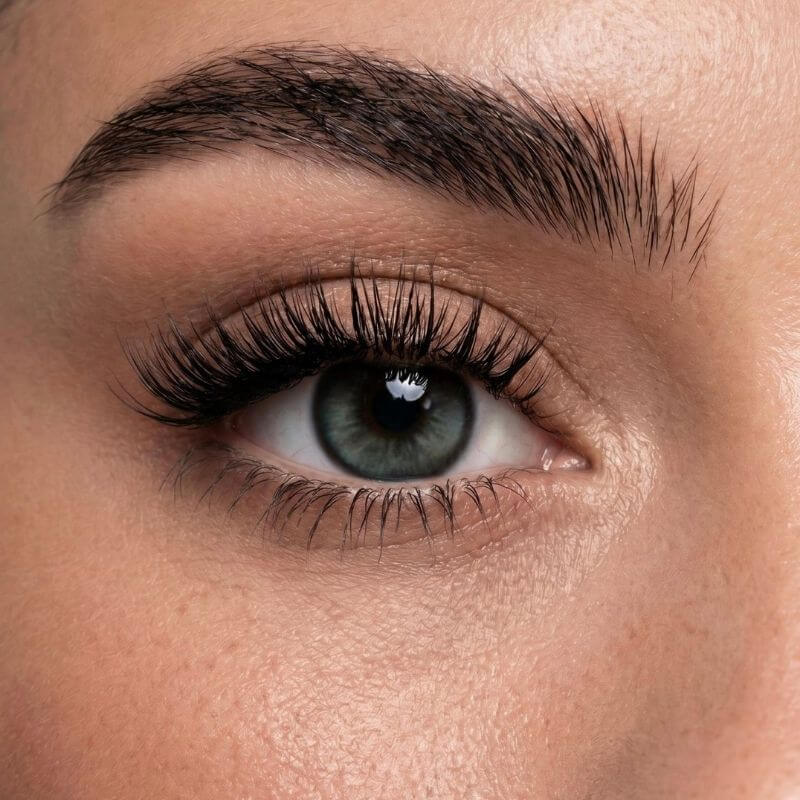 Ariel Teal Blue colored contact lens on eye with cool teal-blue tone and dramatic lashes