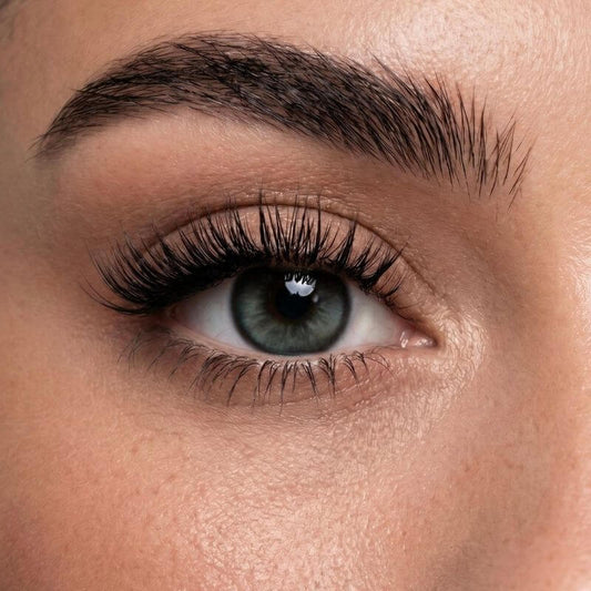 Ariel Teal Blue colored contact lens on eye with cool teal-blue tone and dramatic lashes